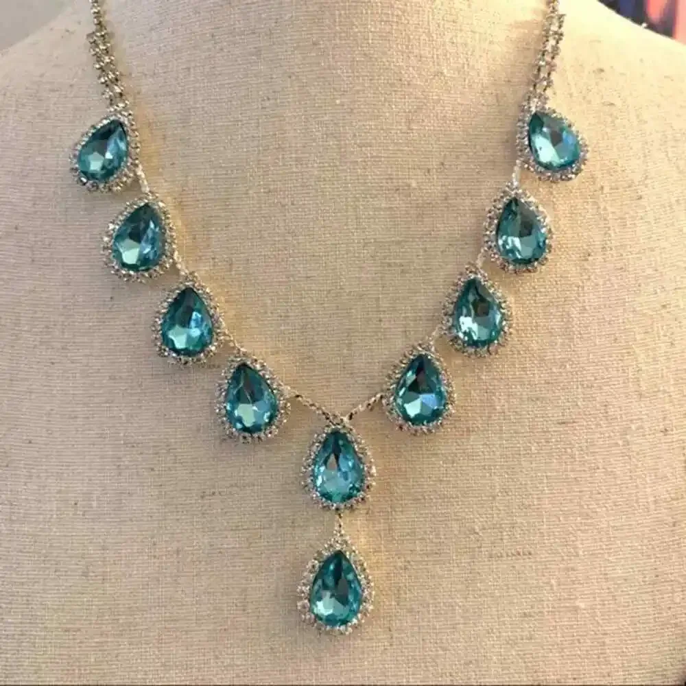 Rhinestones and blue pear crystal necklace. 16” 3” extension. Lobster clasp‎
